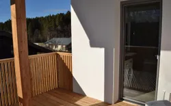 Bild 24: Loggia mit Waldblick