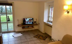 Bild 8: Wohnzimmer mit Ausgang zur Terrasse