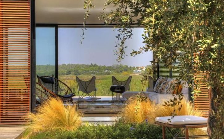 Exklusive Designvilla in Dünenlage am Meer, Dachterrasse mit Pool