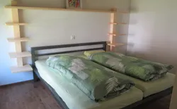 Bild 9: Schlafzimmer mit Doppelbett